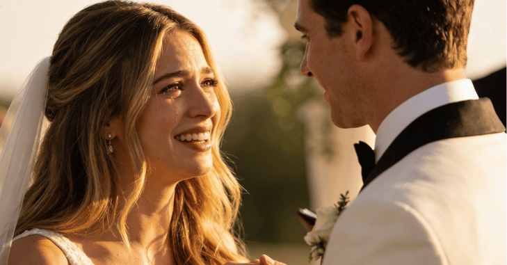 Guests watching an emotional wedding ceremony
