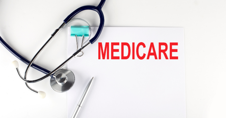 Medicaid application forms spread across a desk